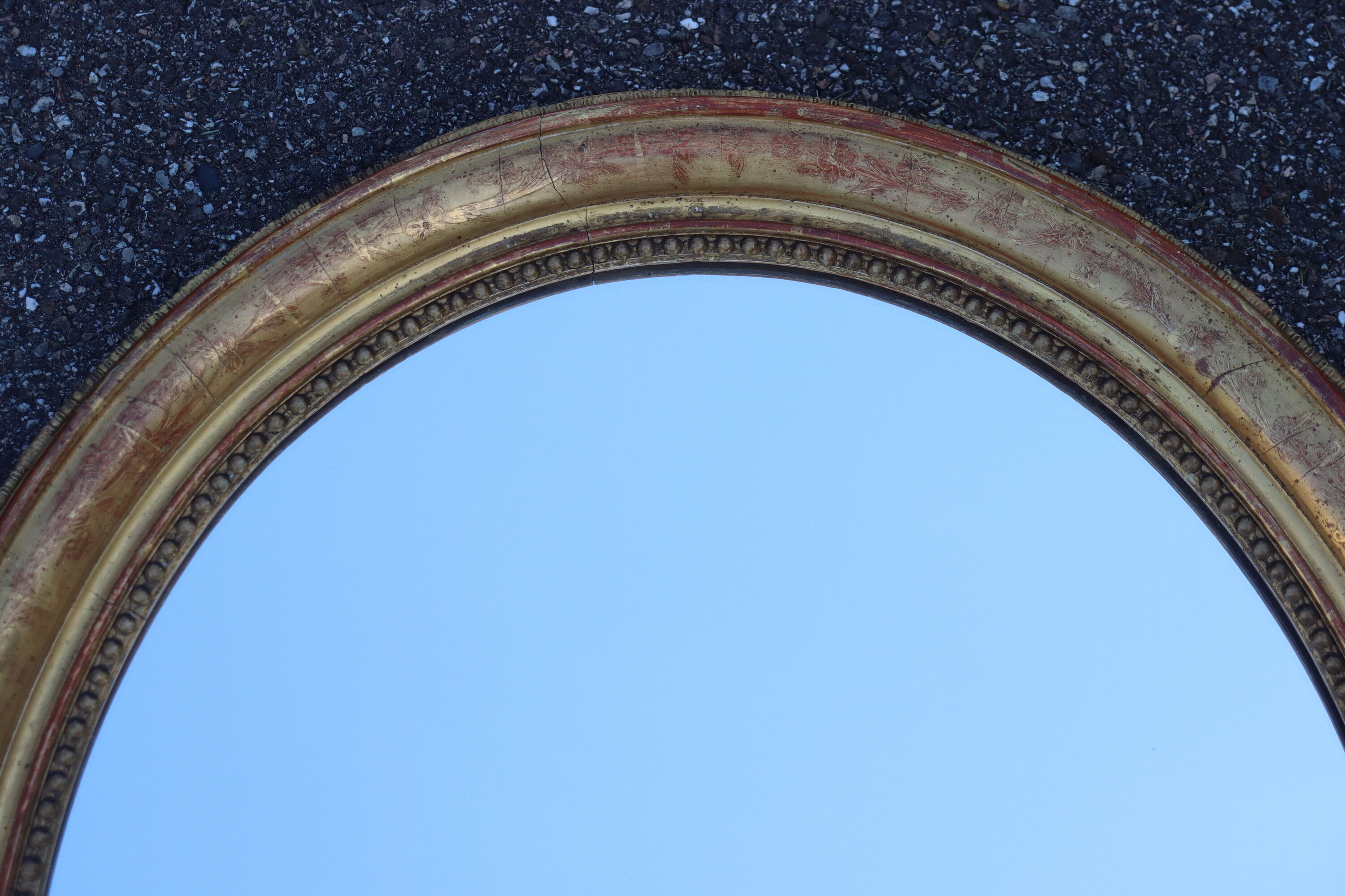 Pair of oval mirrors from the Louis Philippe period in gilded wood.