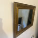Framed mirror with a gilded wooden frame — 82 x 61 cm