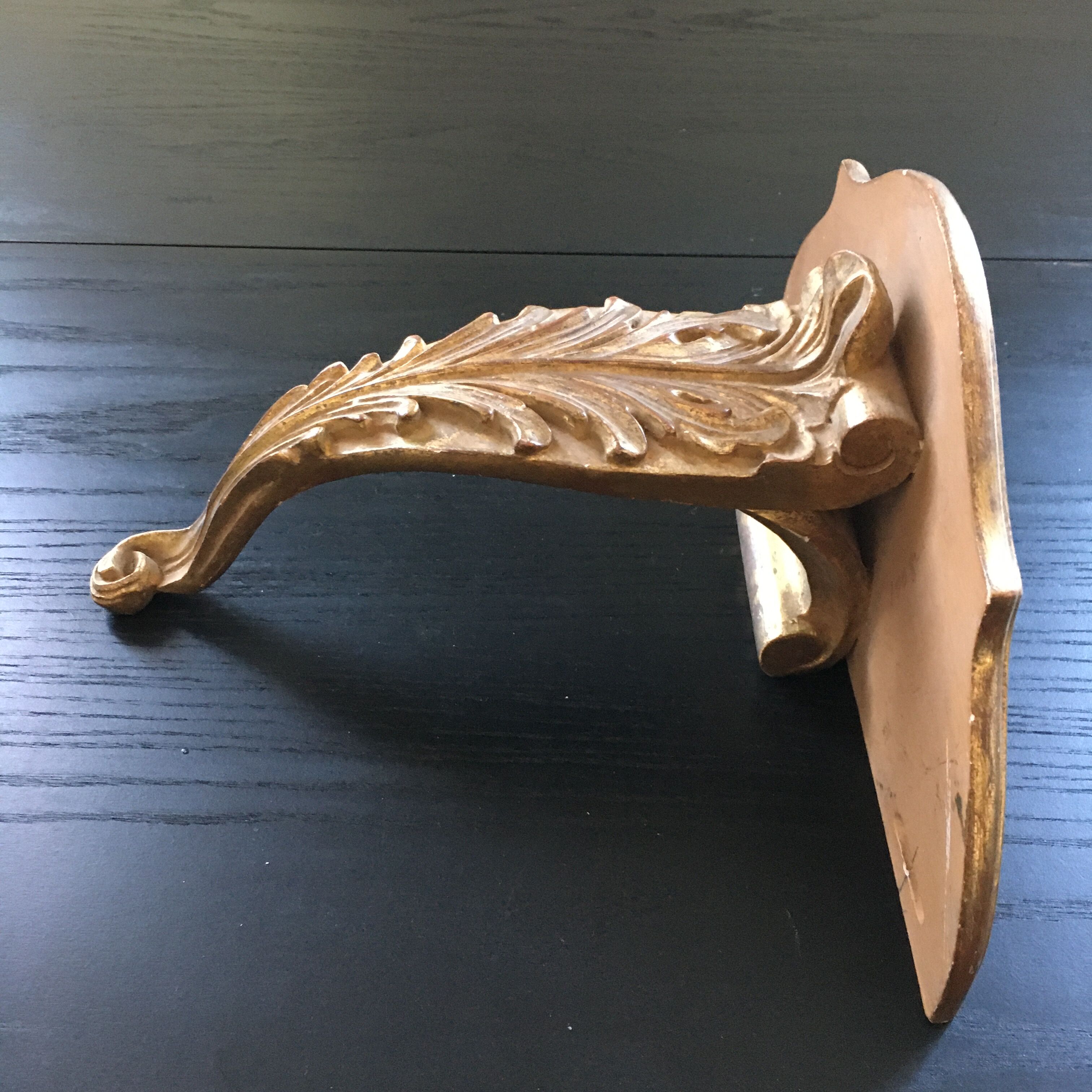 Gold patinated wall console