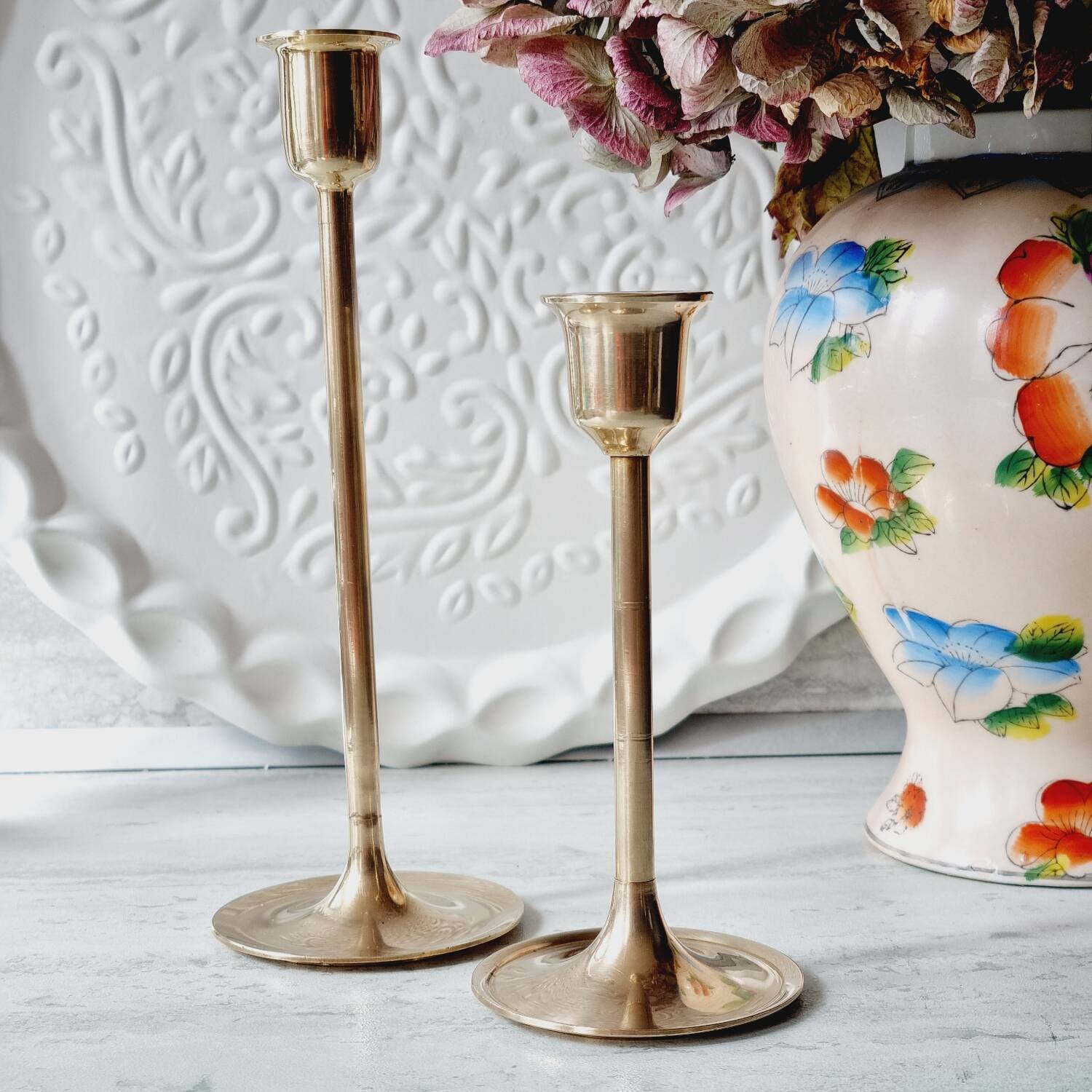 Duo of brass candlesticks