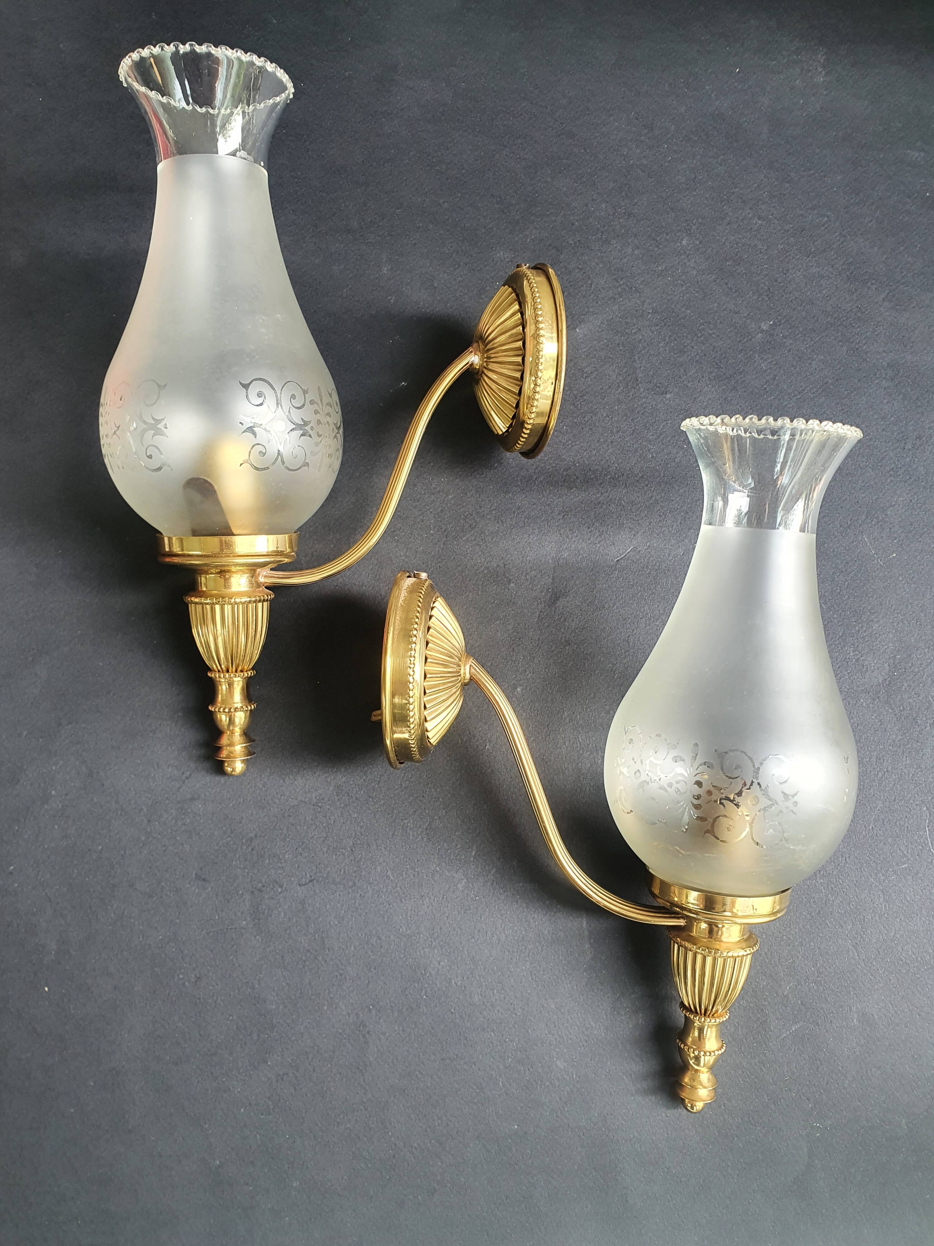 Pair of antique gold wall sconces
