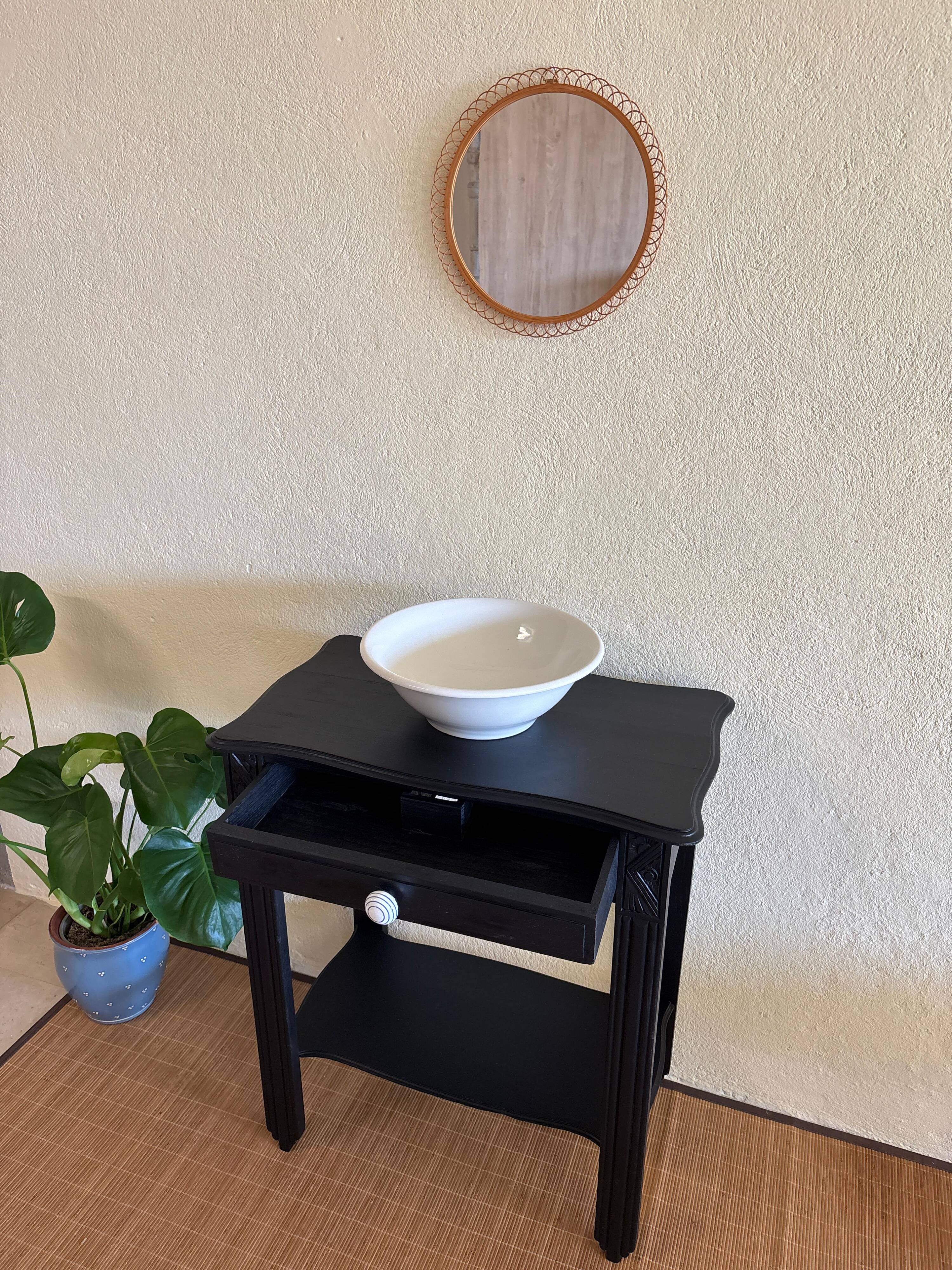 Small Art Deco console reinterpreted – matte black wood with drawer
