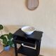 Small Art Deco console reinterpreted – matte black wood with drawer