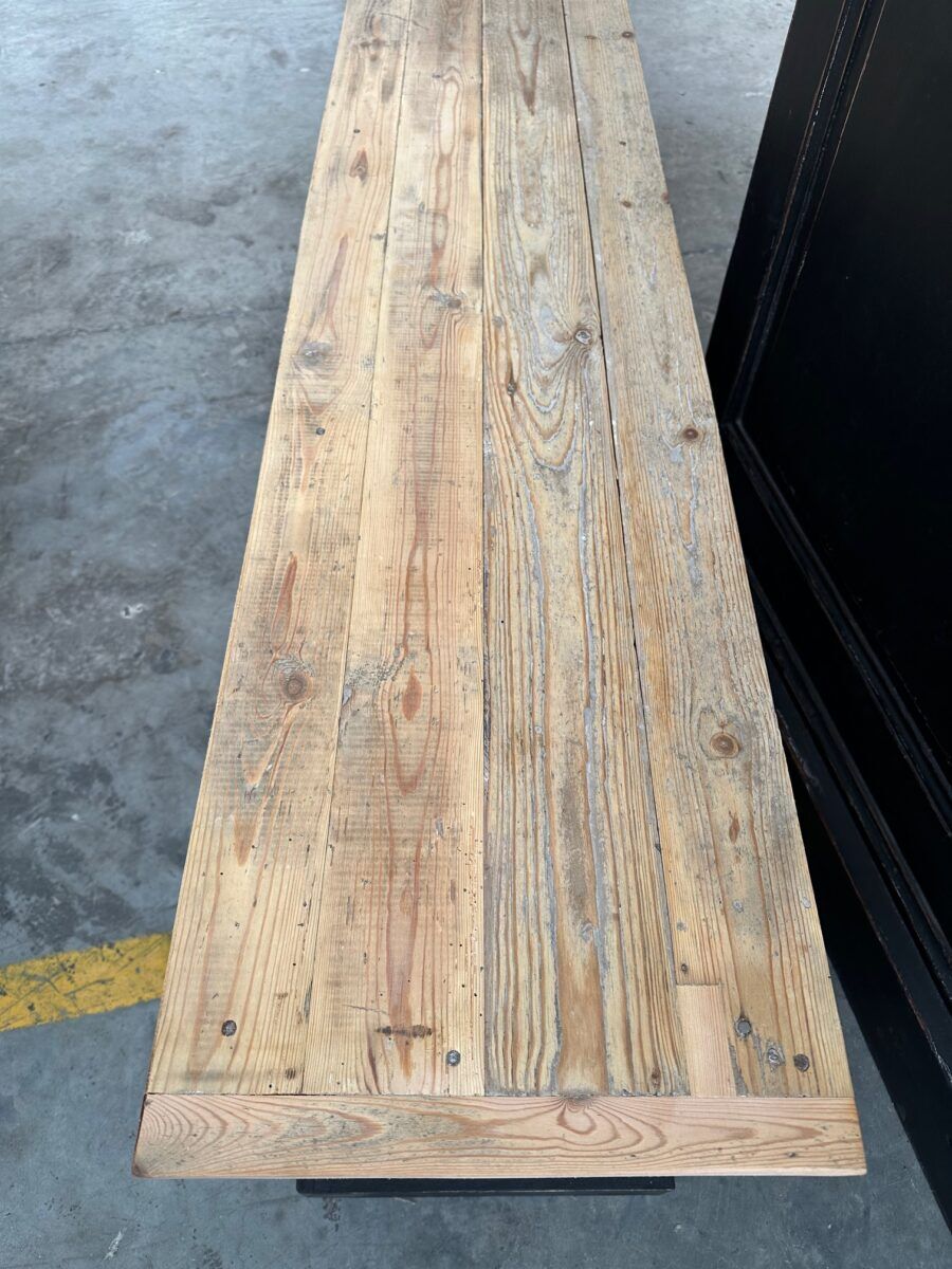 Old workshop furniture transformed into a TV unit.