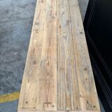 Old workshop furniture transformed into a TV unit.