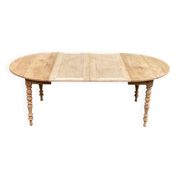 Table à manger ronde extensible à volets décapée en noyer brut 2 rallonges