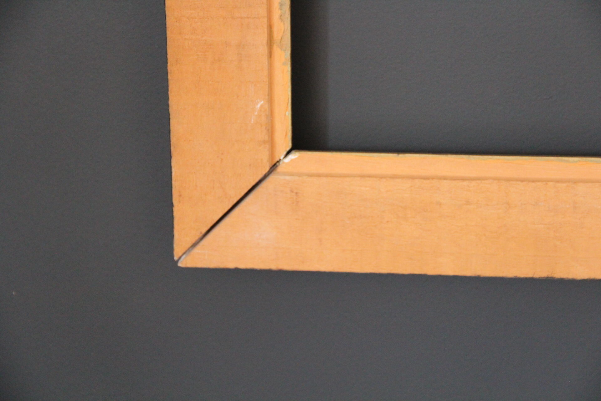 Large wooden black and gilded frame