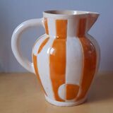 Old enamelled ceramic jug