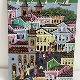 Acrylic painting, naive art, street scene Brazil, colorful colonial houses, sea, sailing boats