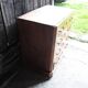 Old wooden chest of drawers with 4 drawers on wheels