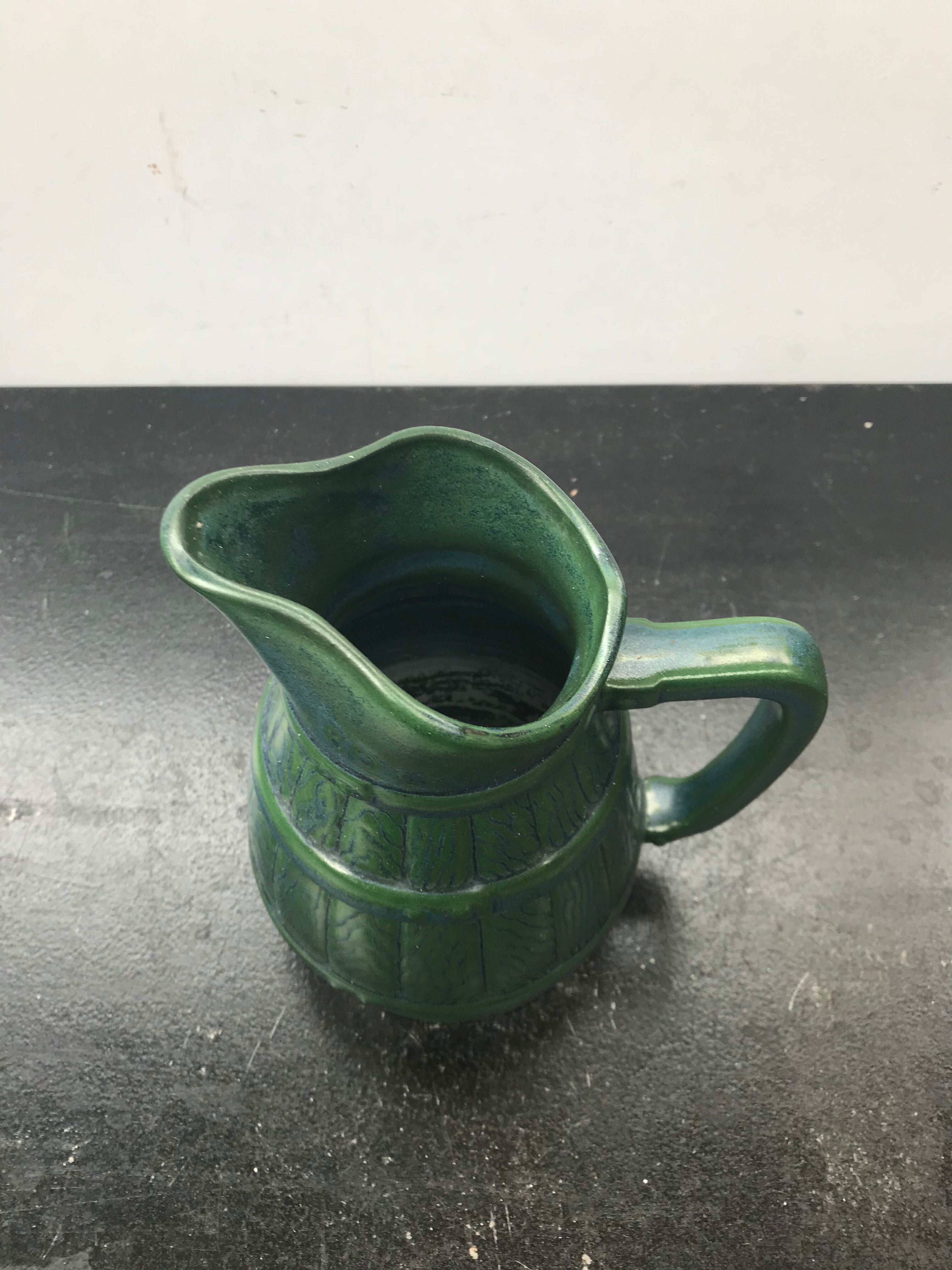 Former green ceramic pitcher shape tonneau