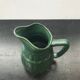 Former green ceramic pitcher shape tonneau