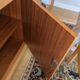Modernist enfilade with a checkerboard pattern in light wood and mahogany marquetry,