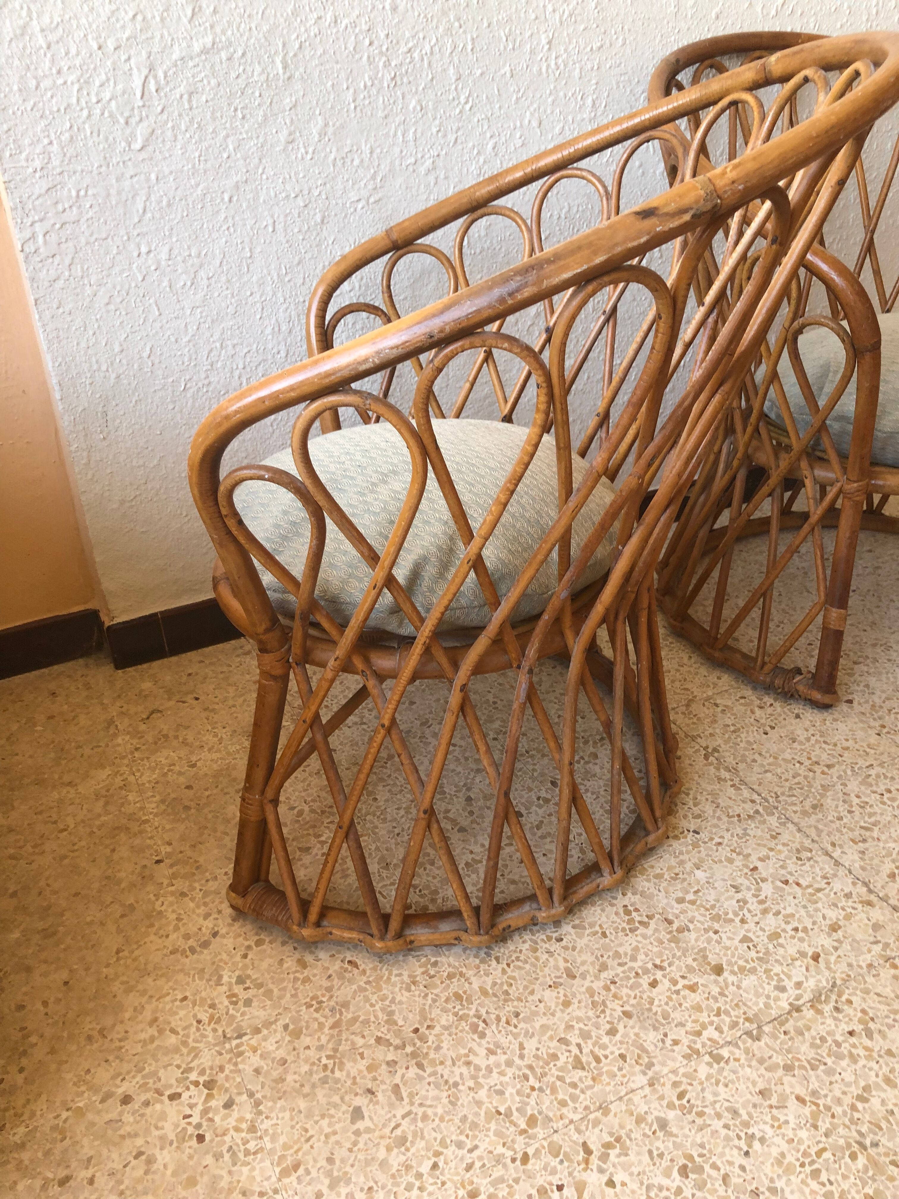 Pair of vintage rattan armchairs