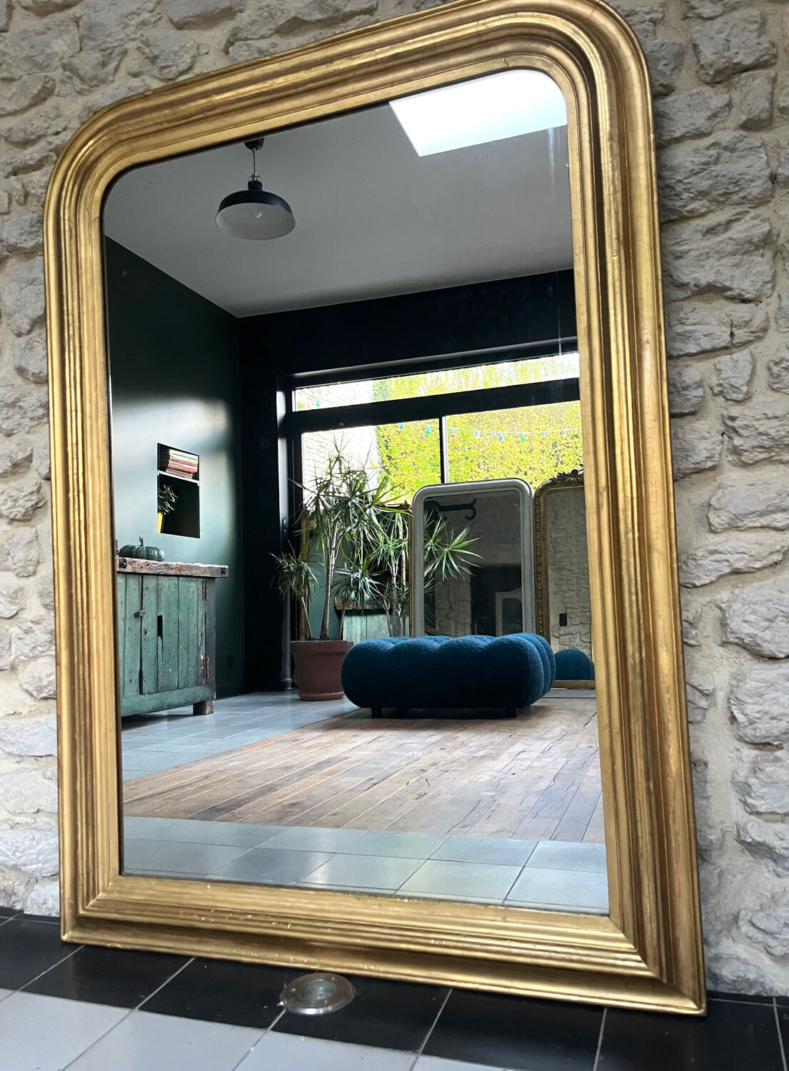 Antique mirror 136.5/98cm Louis-Philippe pearl-gilded with gold leaf.