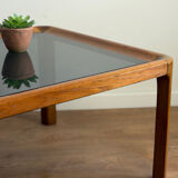 Large Scandinavian coffee table in teak and smoked glass.