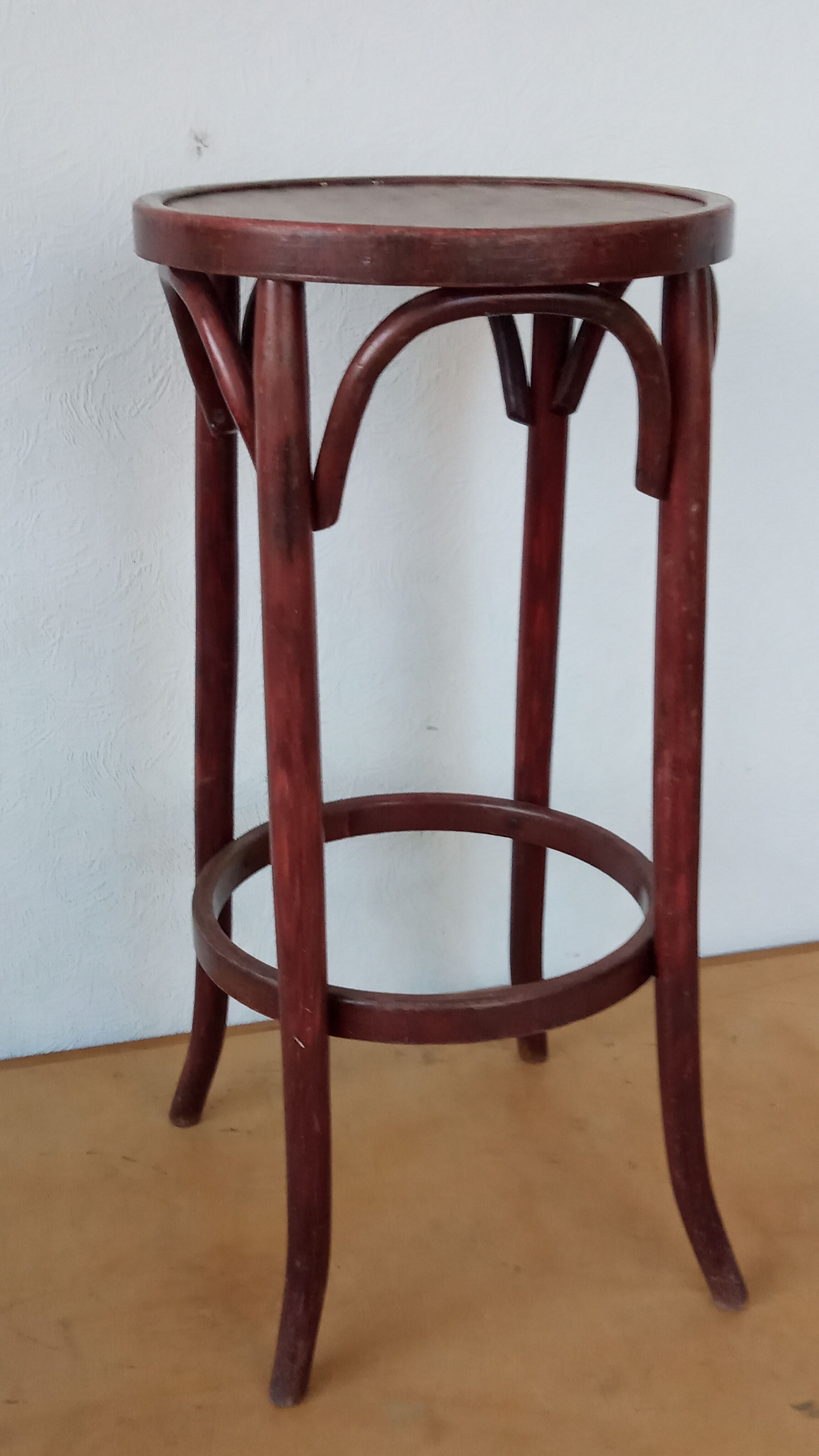 Curved wooden bar stool