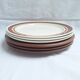 Assiette plates à fleurs marron années 1970
