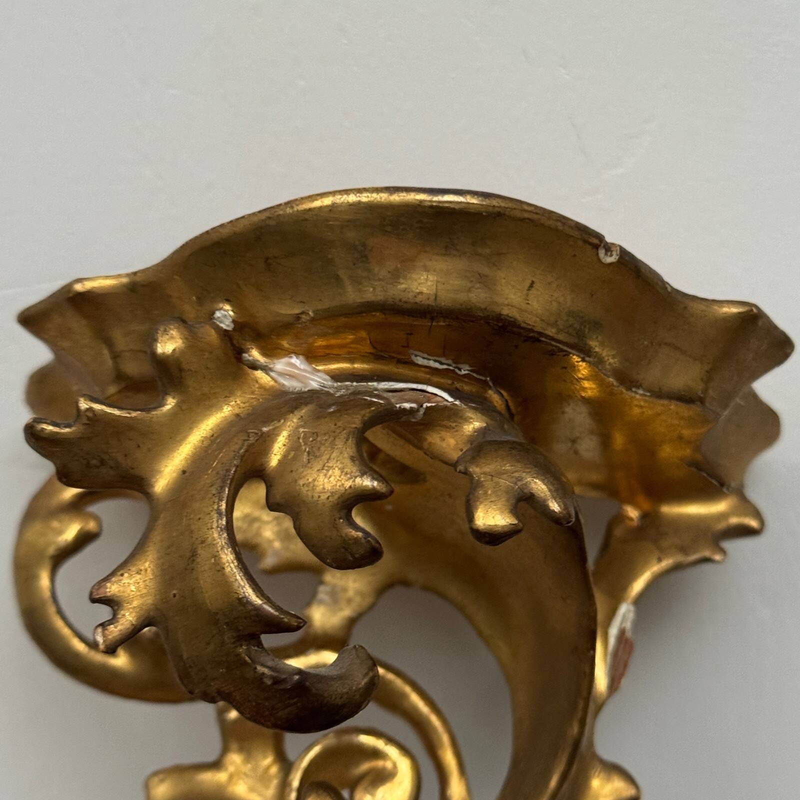 Set of three gilded wood consoles in Rococo style, late 19th century.
