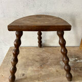Wooden tripod farm stool