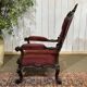 Fauteuil en acajou 19ème richement sculpté de style baroque