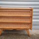 Commode vintage pied compas et rotin