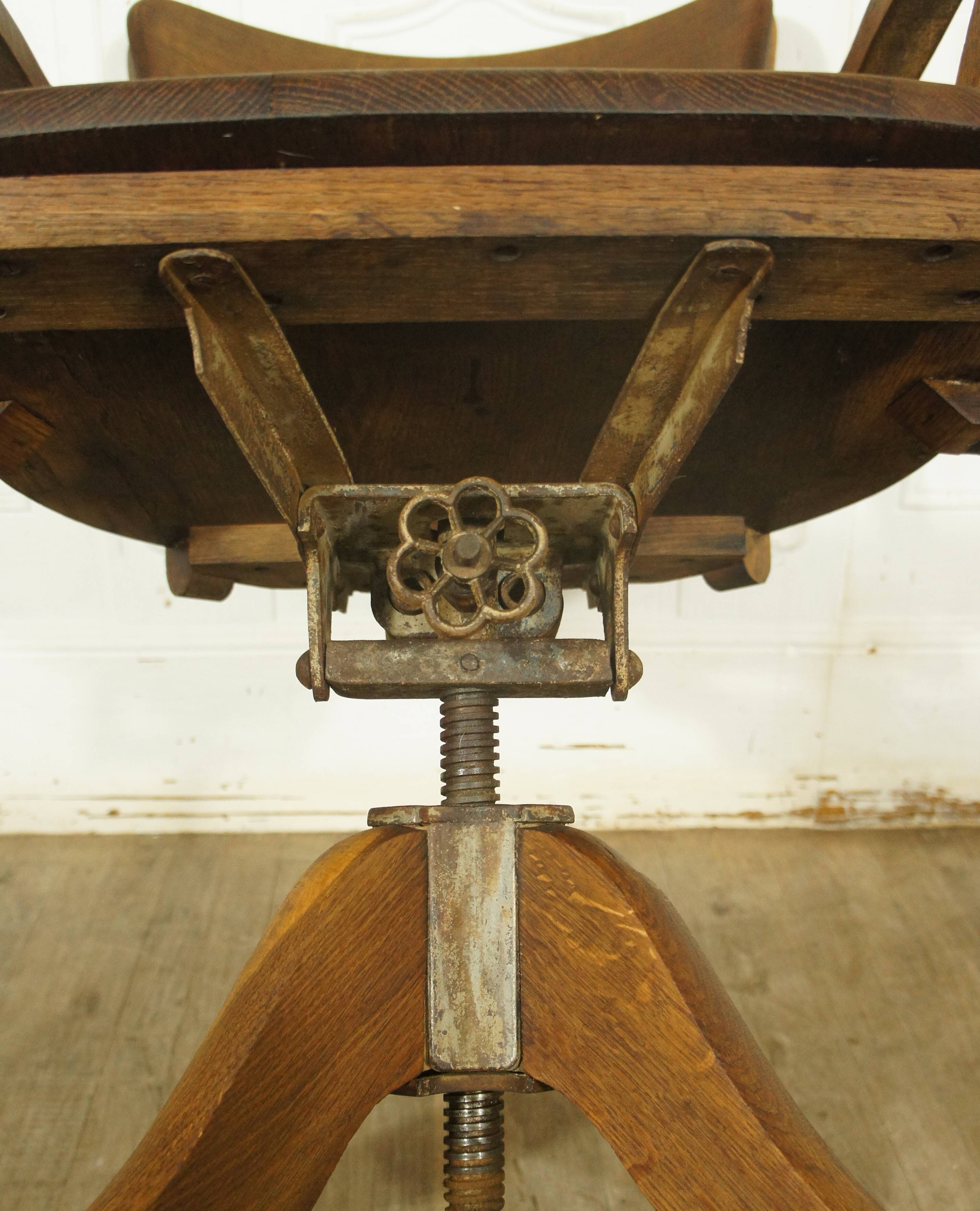 American solid oak armchair, swivel 360 °, tilting & adjustable in height. c. 1920