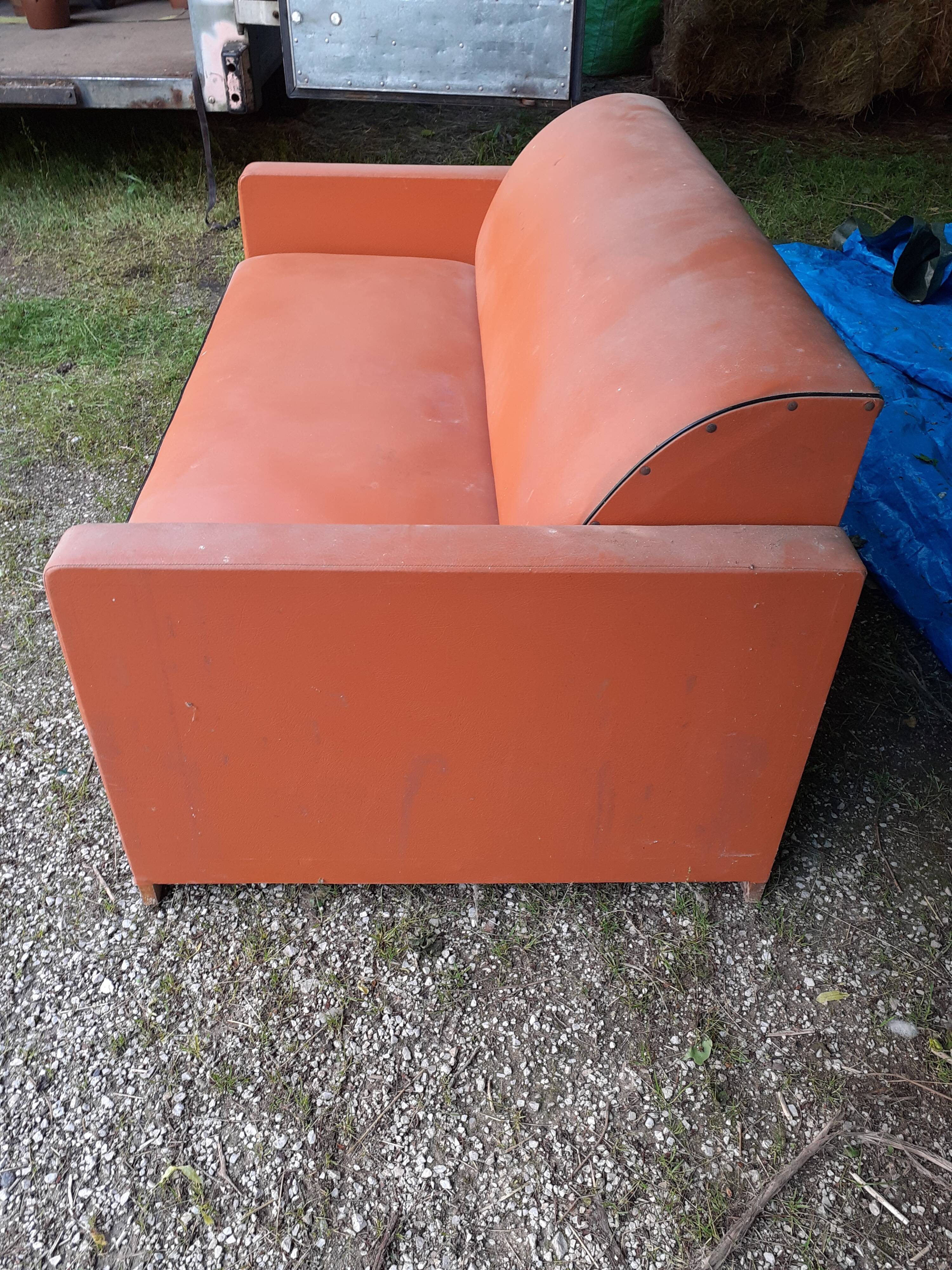 Skai orange convertible sofa 1950s
