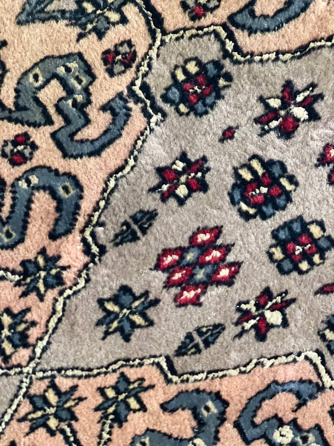 Antique Persian rug, signed.