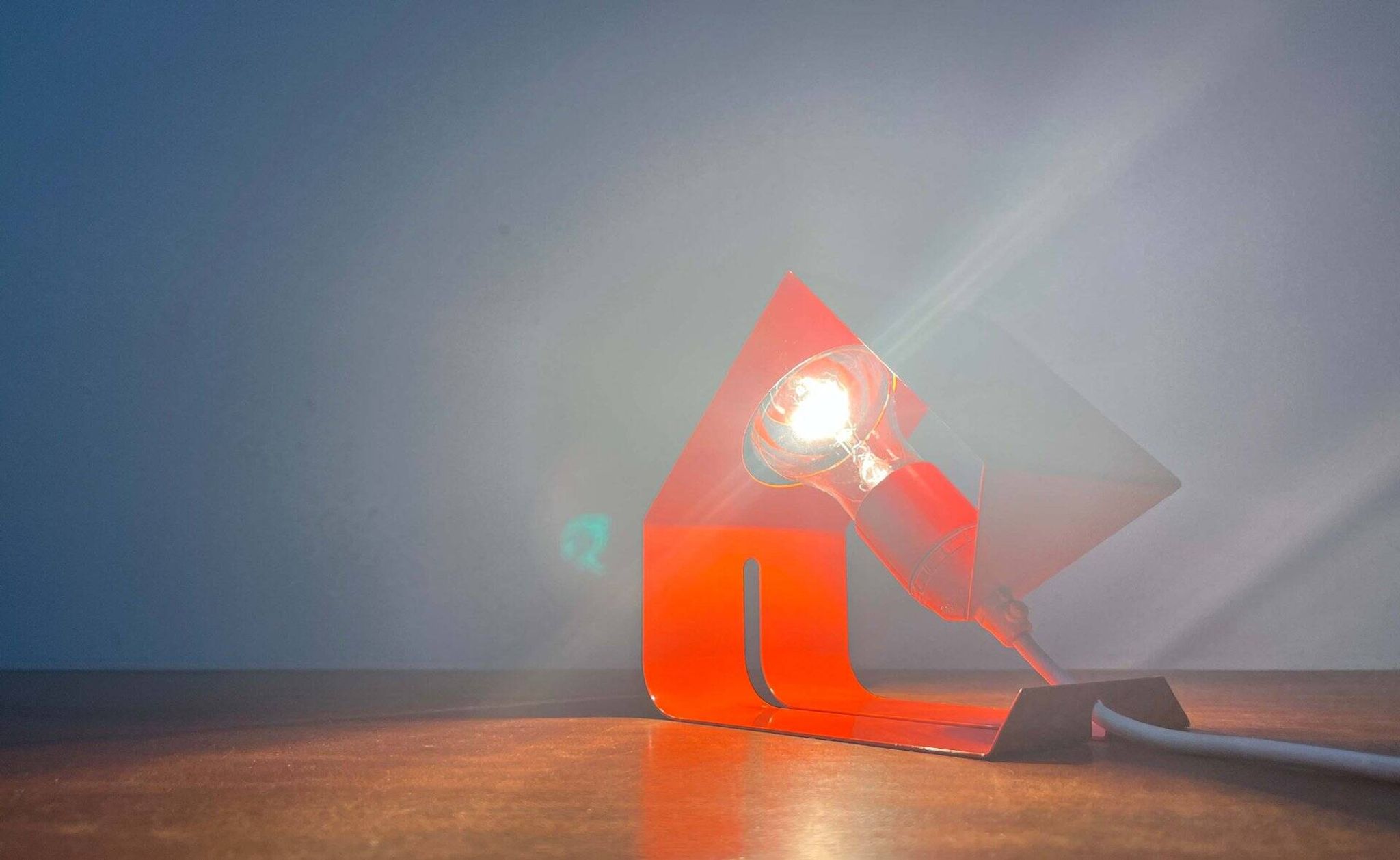 Orange metal table lamp, minimalist, modern mid-century space age, 1960s.
