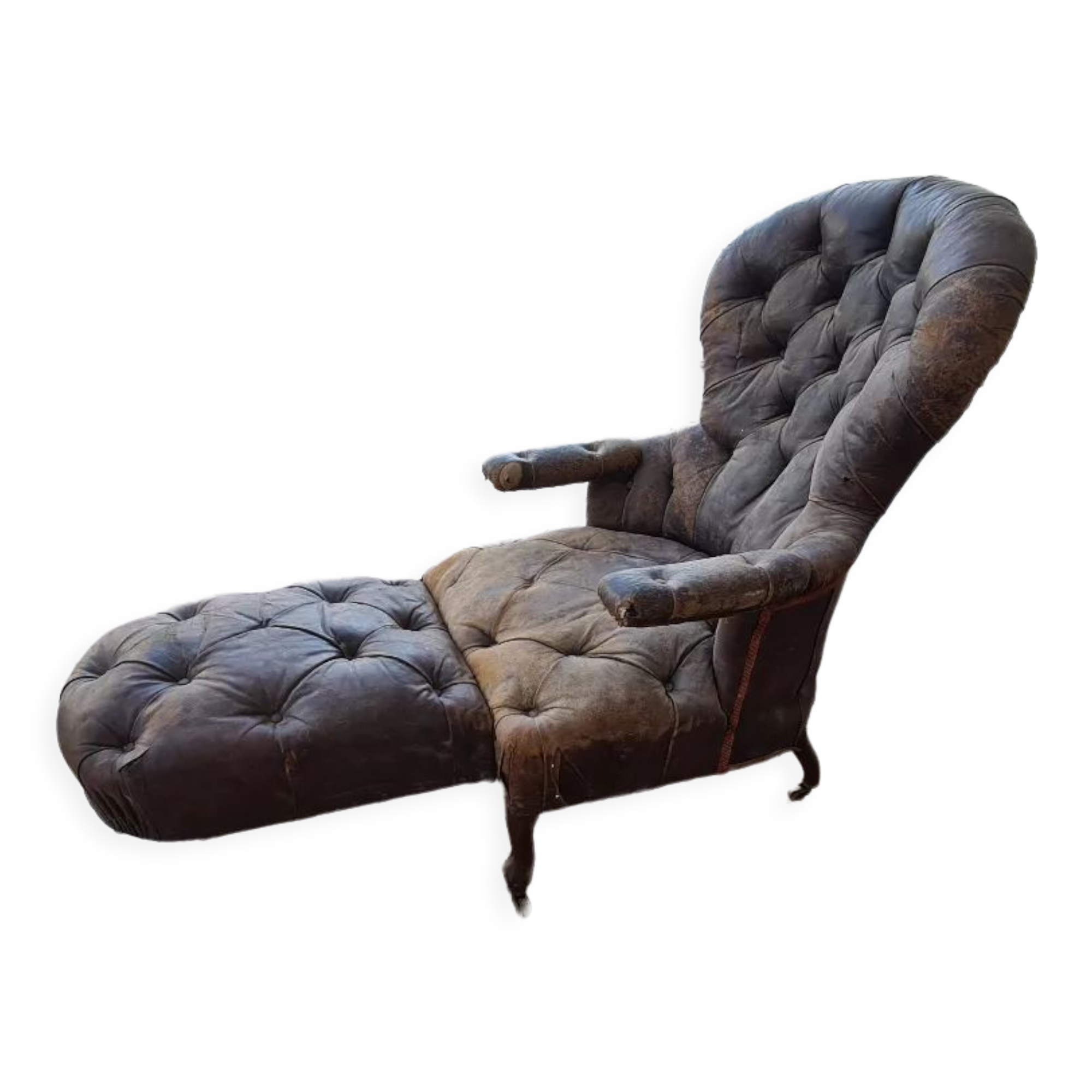 Chesterfield armchair with folding footrest