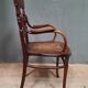 Curved wooden armchair Kohn