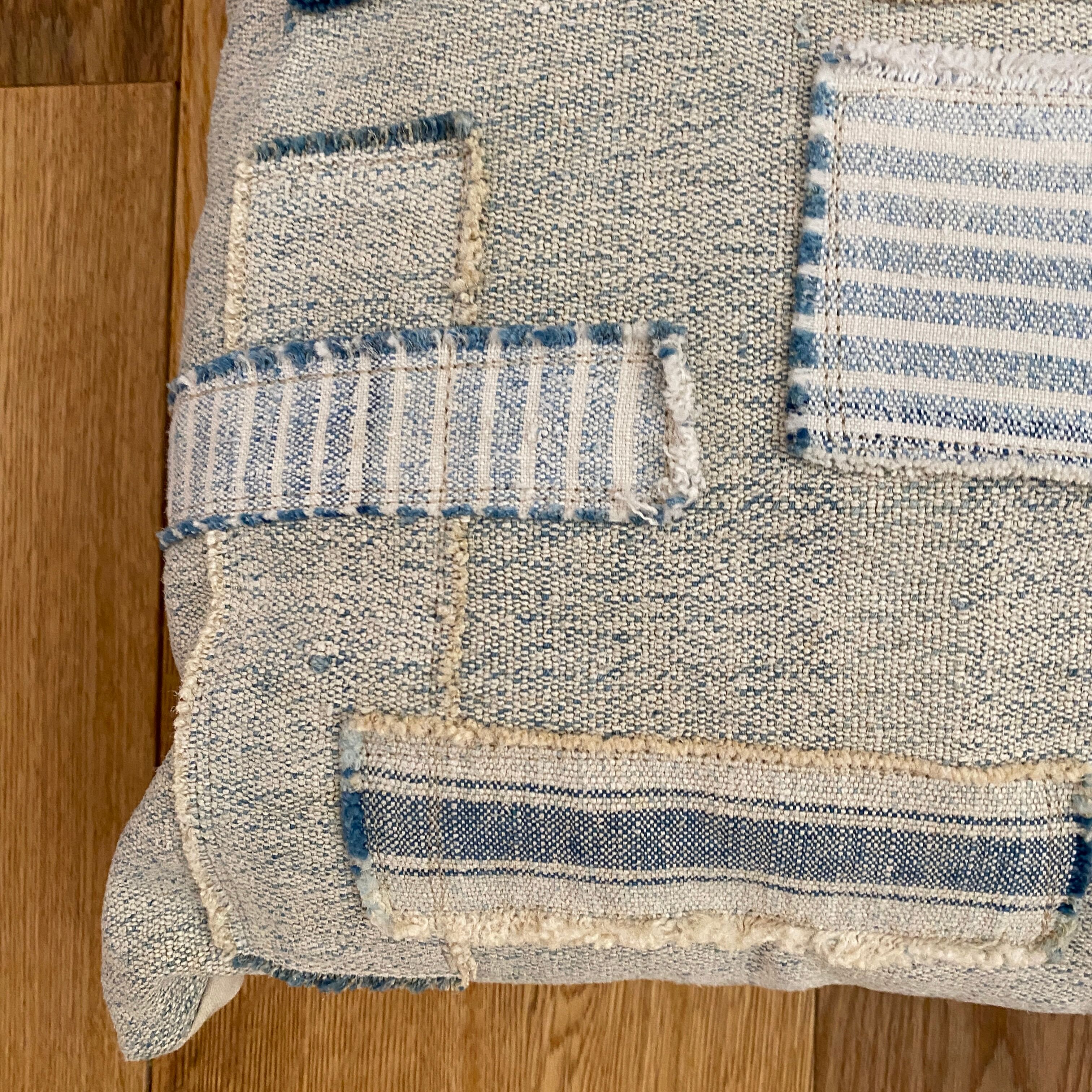 Old canvas cushion woven kilim style, patched