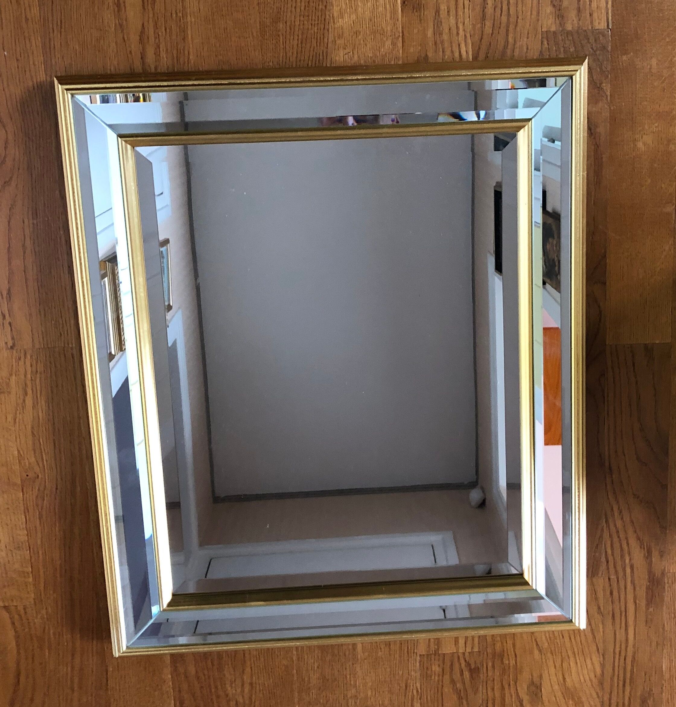 Bevelled mirror with parecloses - 63x53cm