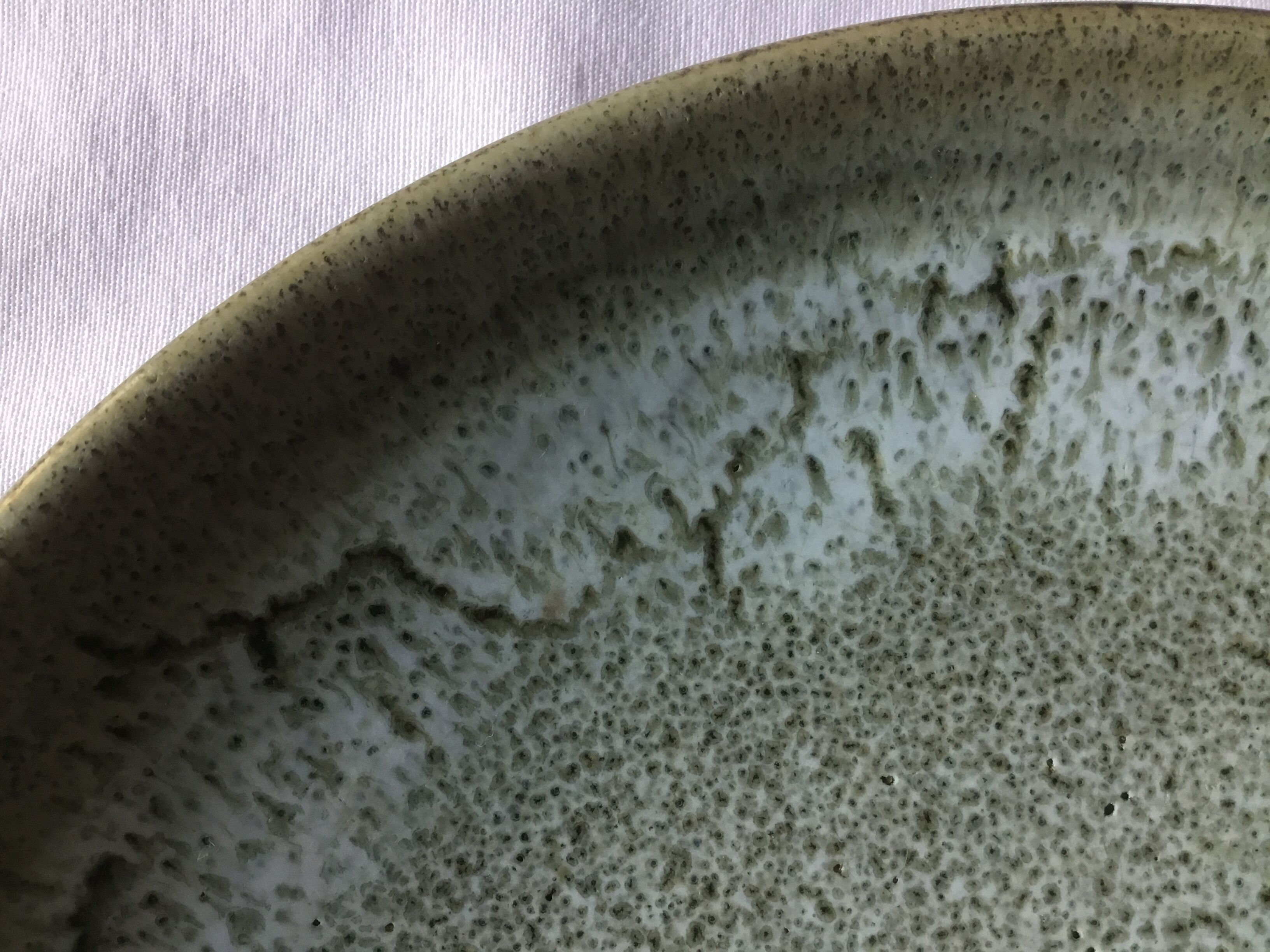 Emailed sandstone plate