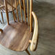 Set of 2 Windsor chairs with armrests.