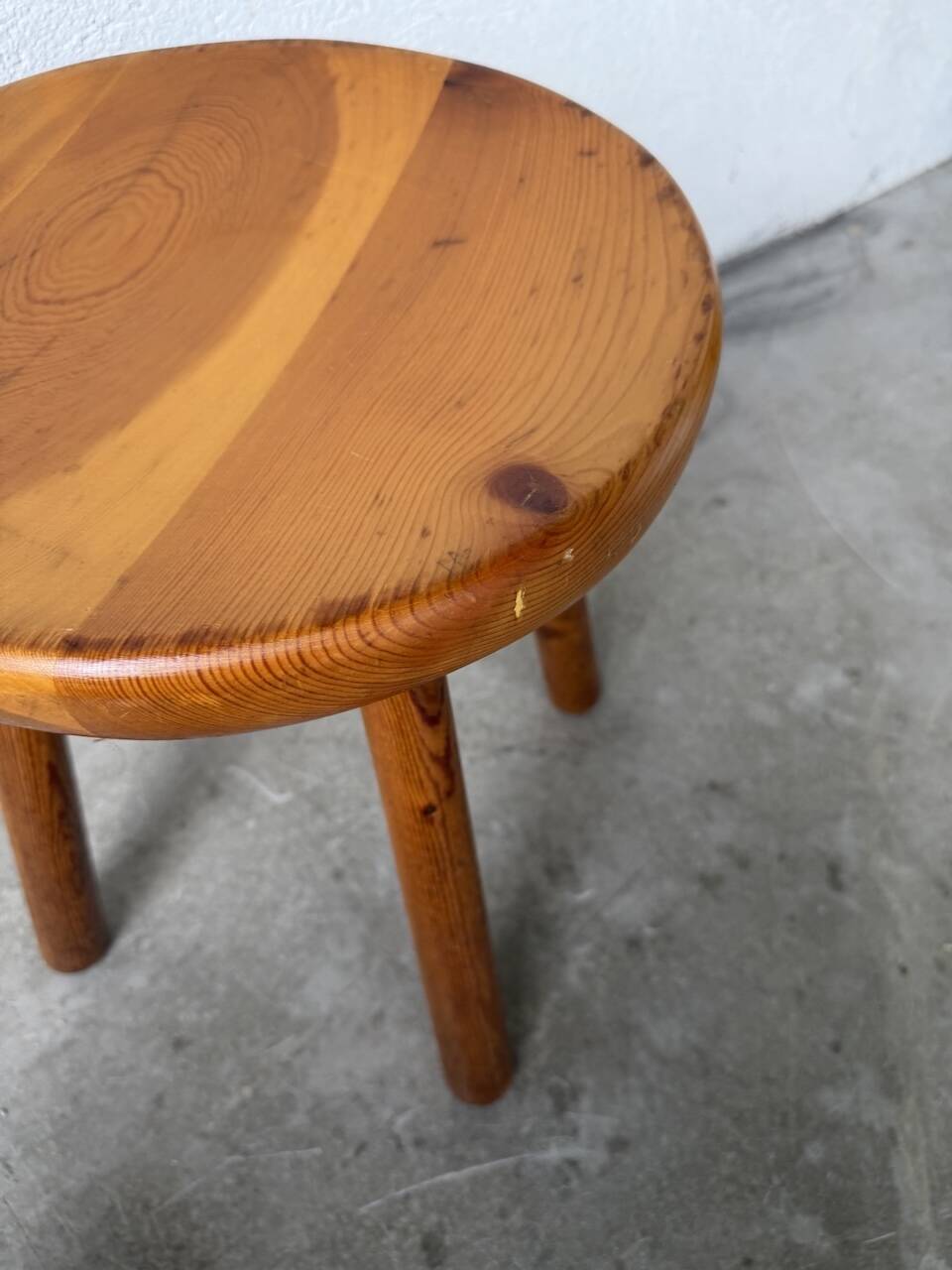 Pine stool assigned to Charlotte Perriand for Les Arcs.