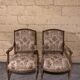 Pair of antique carved wooden armchairs