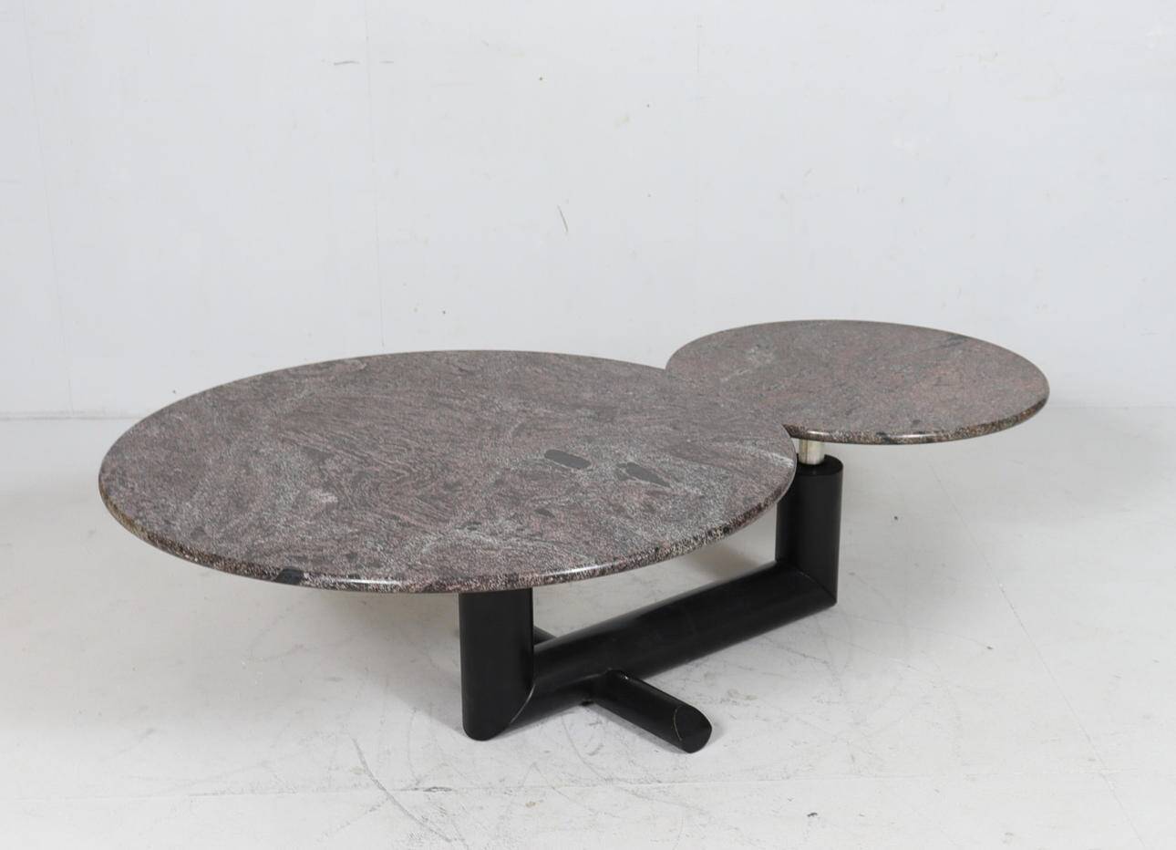 Sculptural coffee table in granite and wood, Italy 1980s.