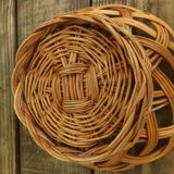 Set of three old rattan baskets
