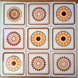 Set of decorative tiles from the 70s, orange pop flowers