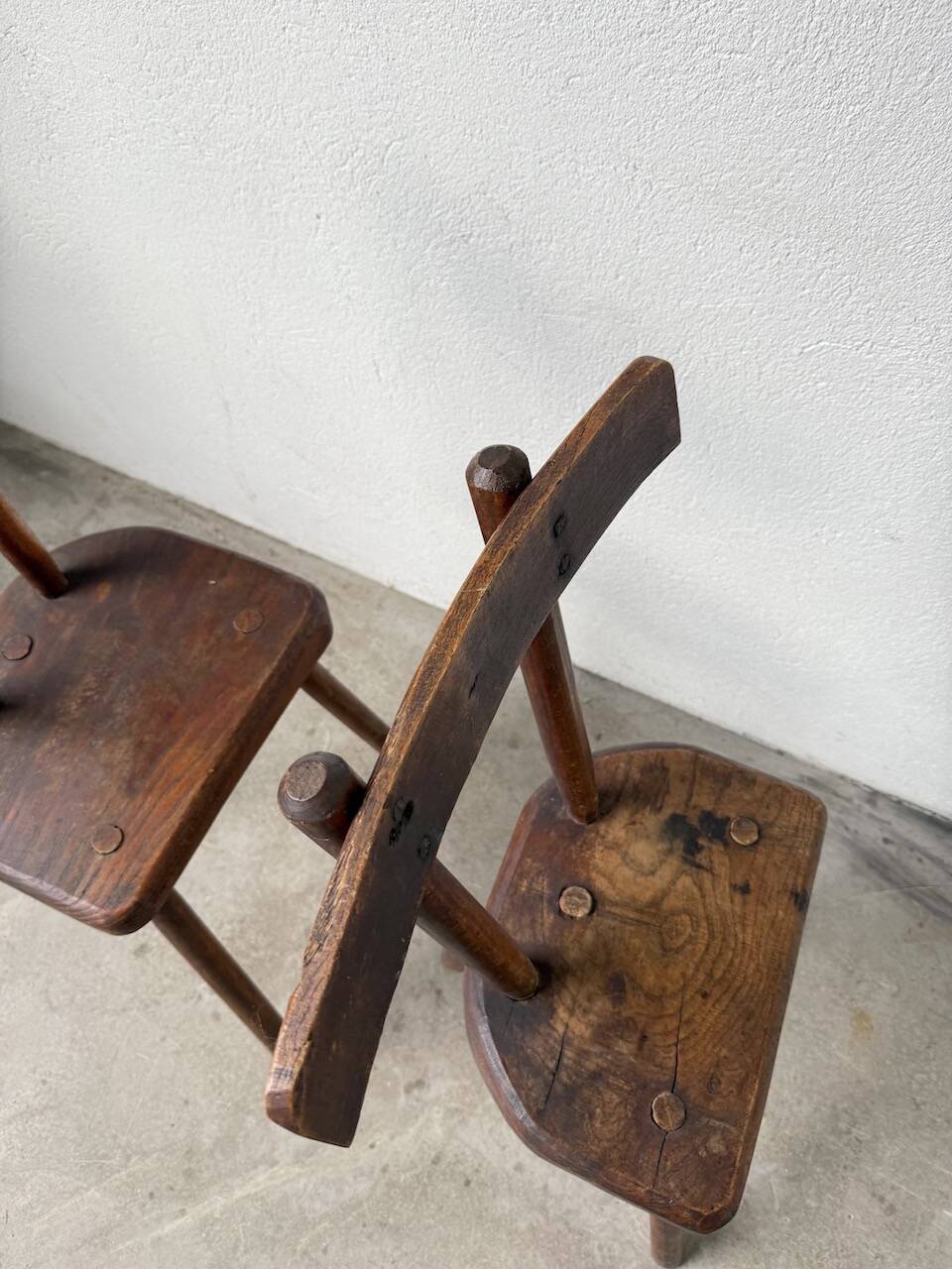 Pair of Savoyard tripod chairs, folk art, oak.