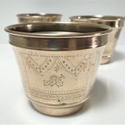 Trois cache-pot laiton couverture argentée patine dorée monogramme début XXème