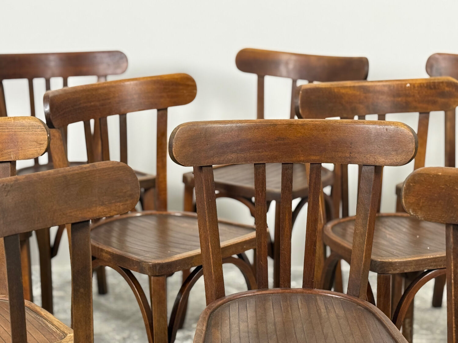 Set of 17 vintage bistro chairs in curved wood — striped seat, be