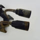 Pair of cast iron wall sconces with articulated arm, dog shape. Vintage