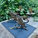 Pair of chimera candle holders in bronze, 19th century.