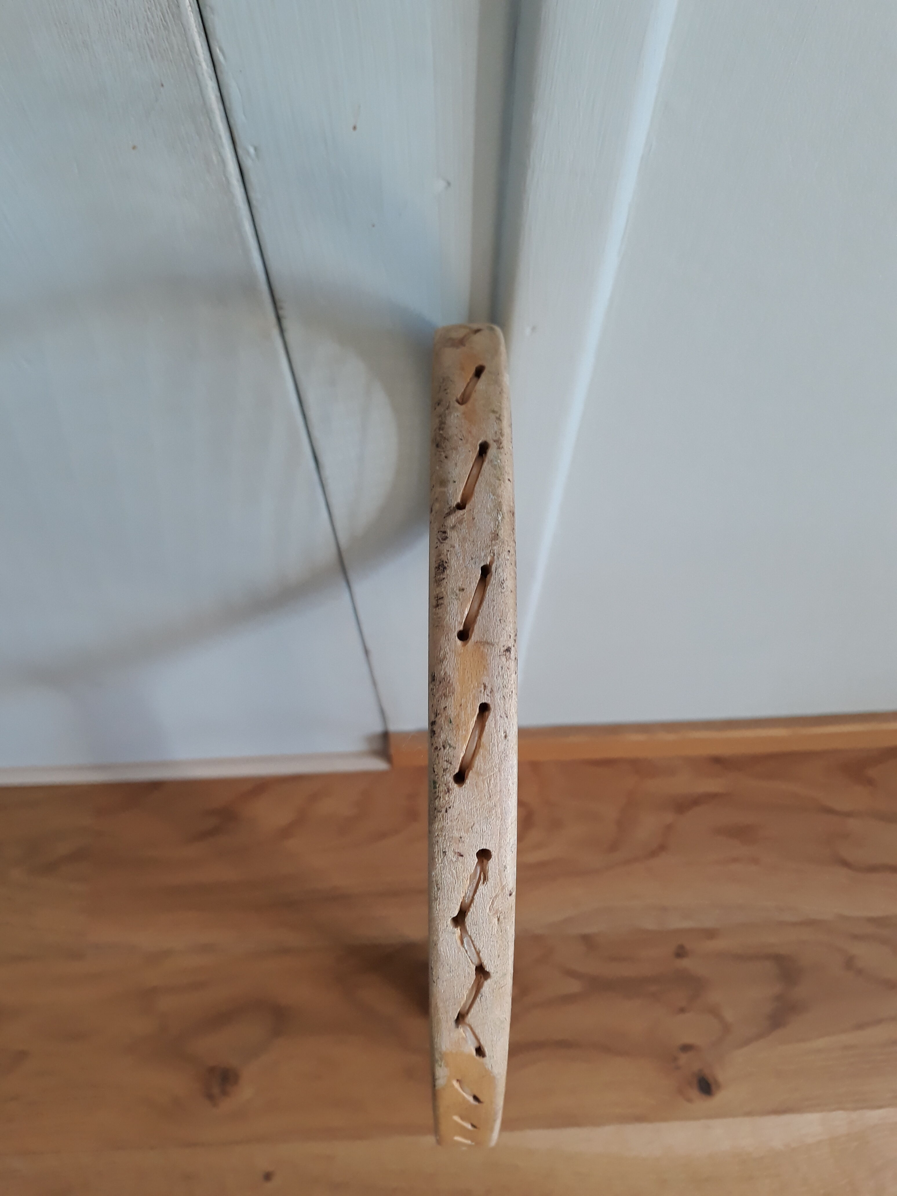 Wooden Dunlop tennis racket with its cover