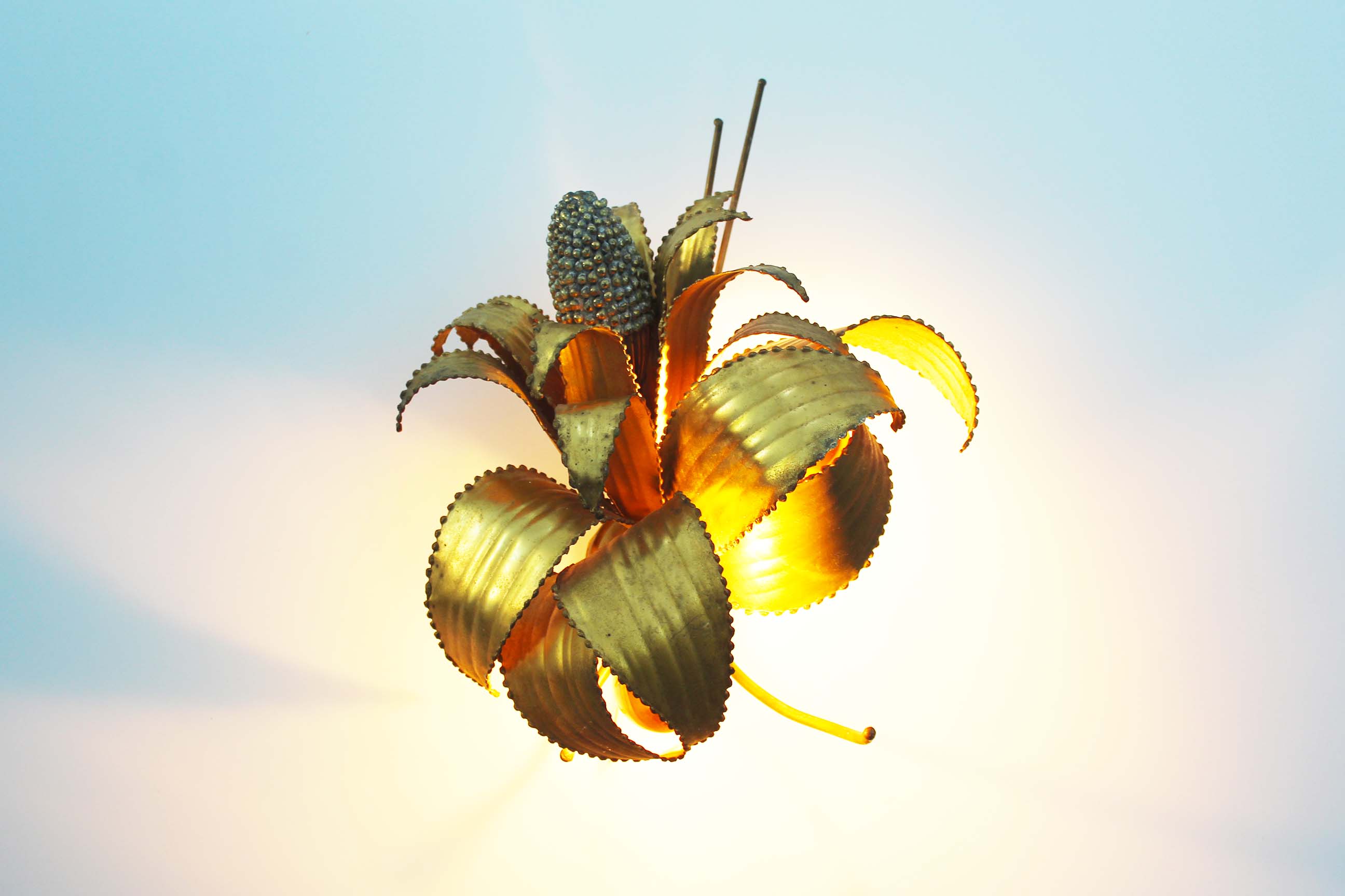 Brass torch cut 'corn cob' wall lamp