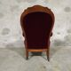 Fauteuil en noyer et velours