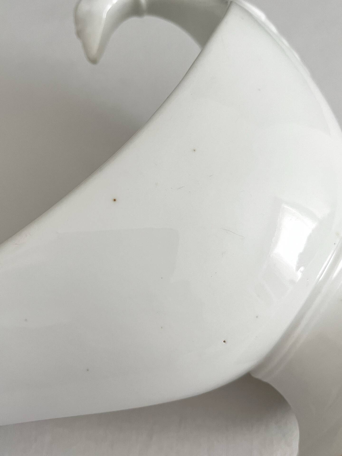 Empire sauce boat with eagle head in antique porcelain